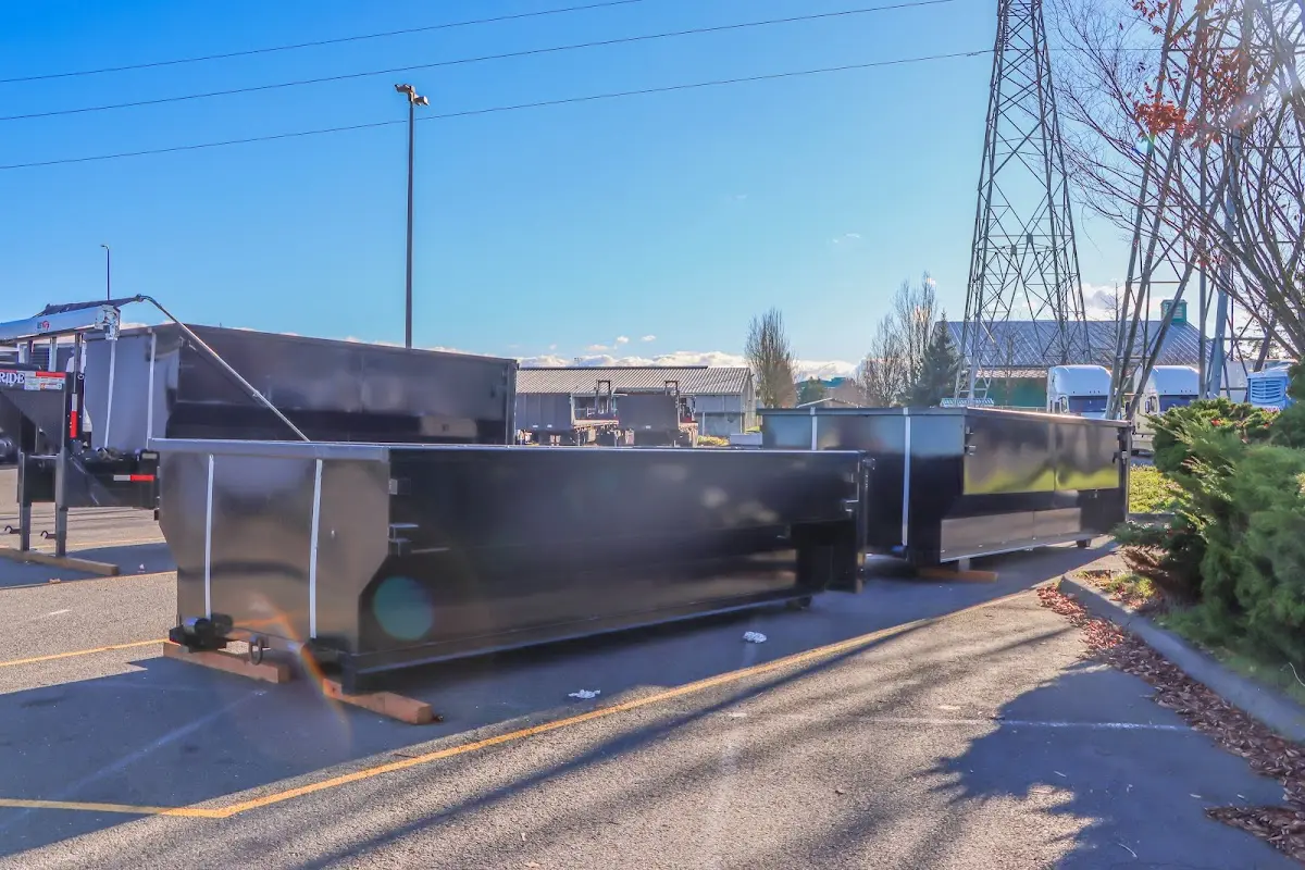 Roll-off dumpster ready for waste disposal at job site for Demolition Dumpster Rental in Huntingdon